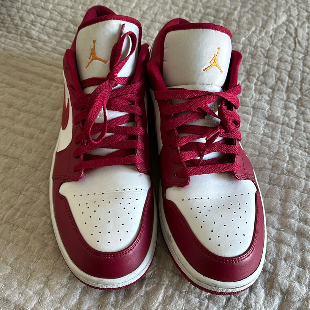 Low top red and white Nike sneakers size 15